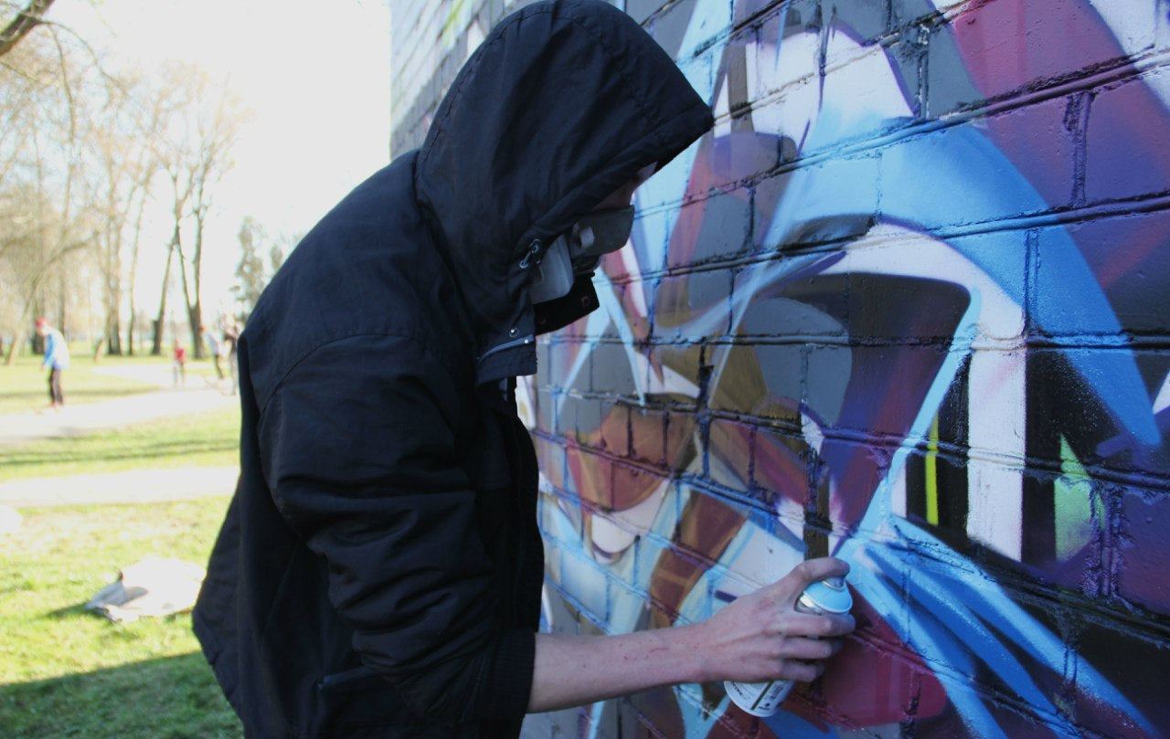 Graffiti on brick — WEKX and TASH, 2013