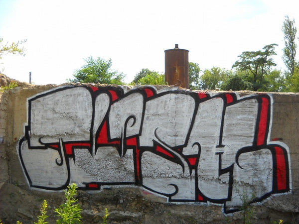 Chrome on a factory wall — TASH, 2009